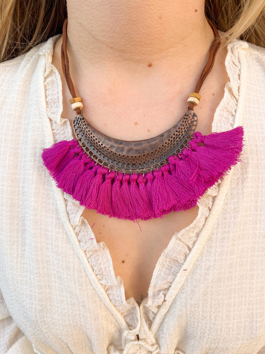 Collier pompons fushia